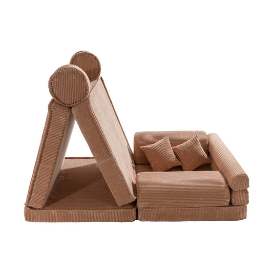 Dusty pink corduroy modular kids' play sofa with bolsters and cushions