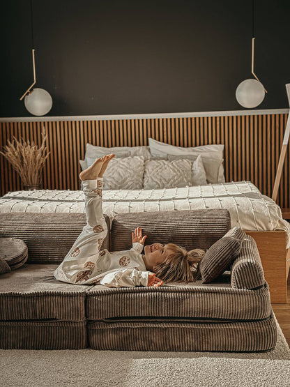 Corduroy Kids' Sofa Brown in a family living room