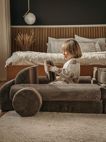 Corduroy Kids' Sofa Brown in a family living room