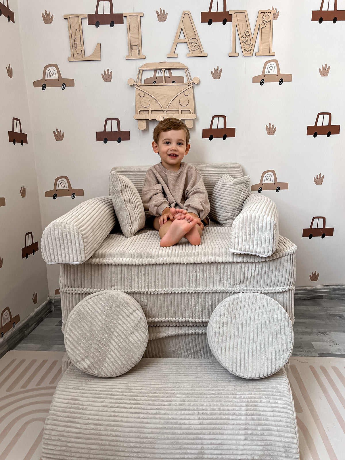 Corduroy Kids' Sofa Ecru in a family living room