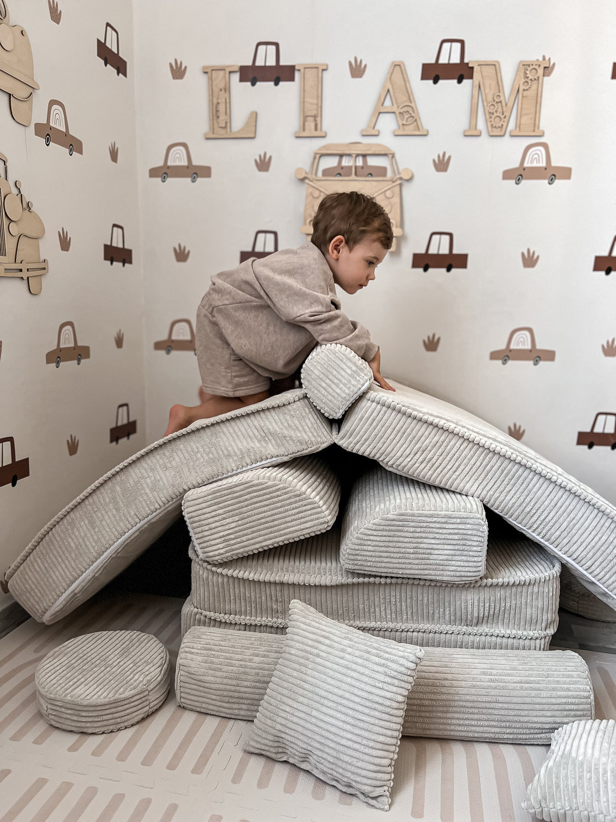 Corduroy Kids' Sofa Ecru in a family living room